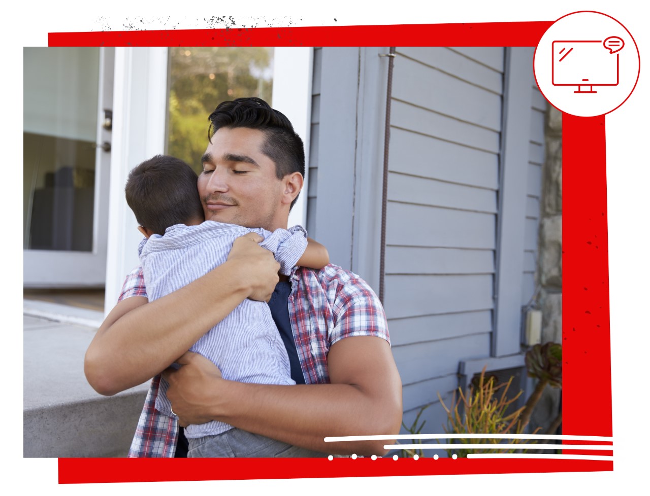 Man embracing a child in front of a house