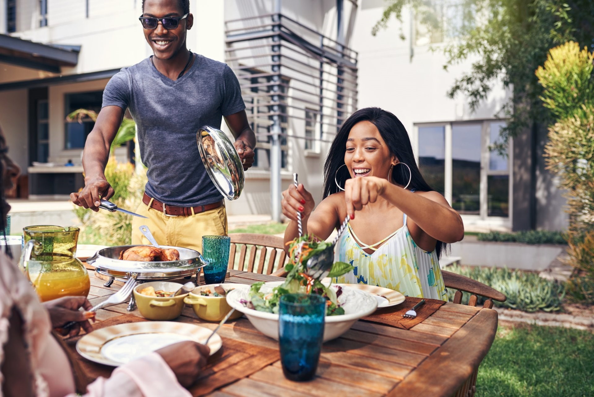 A man and woman having lunch outside