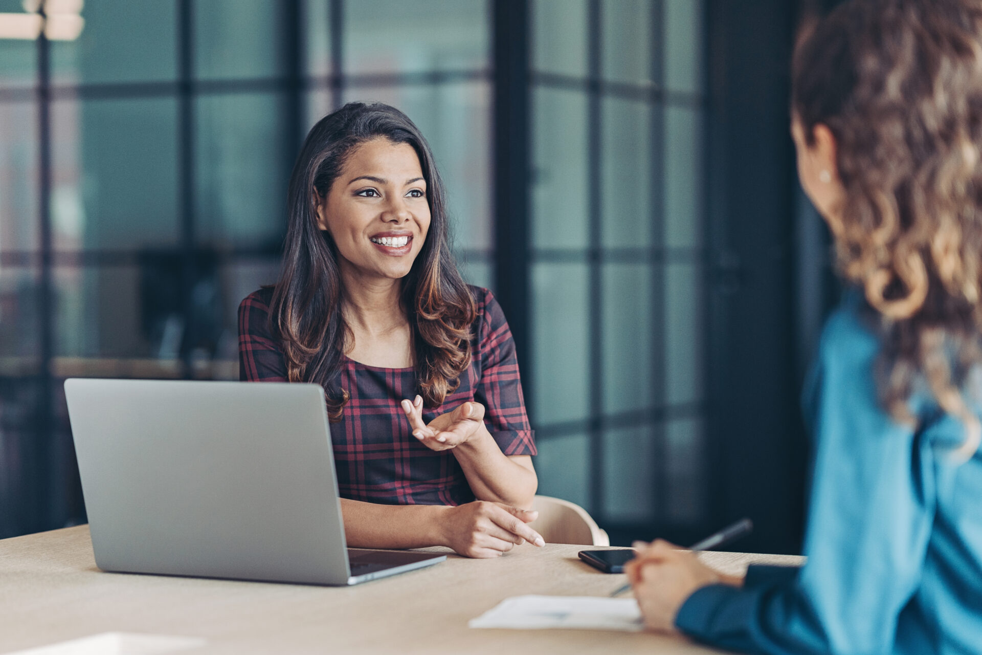 Two businesswomen talking