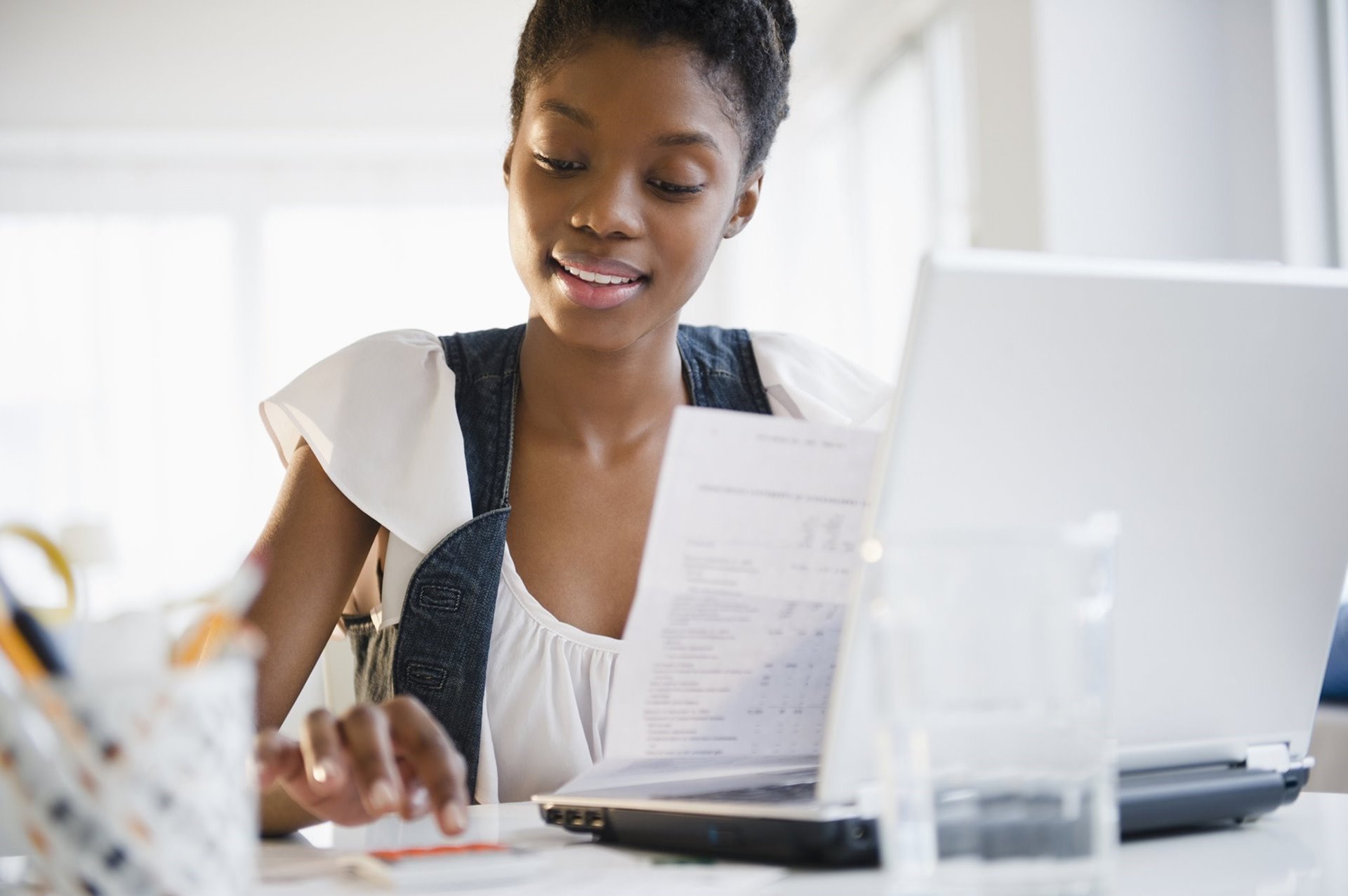 Young black girl on her laptop